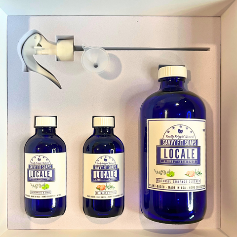 Three bottles of Savvy Fit Soaps Locale, displayed together, showcasing natural and refreshing skincare products for a soothing and aromatic experience.
