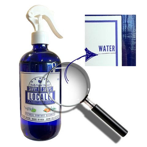 A bottle of Savvy Fit Soaps Locale, showcasing a natural and refreshing skincare product for a soothing and aromatic experience.